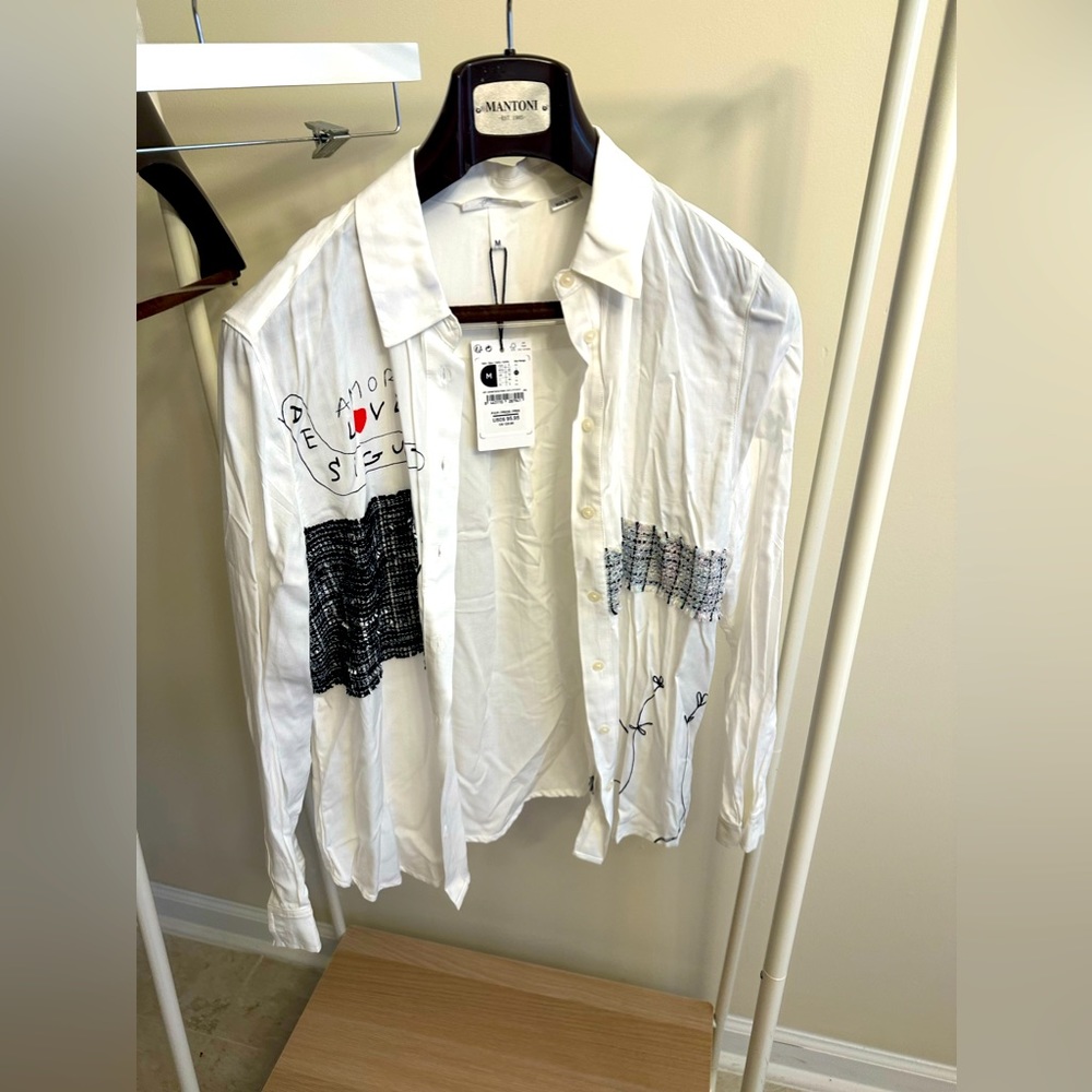 White shirt with accents.